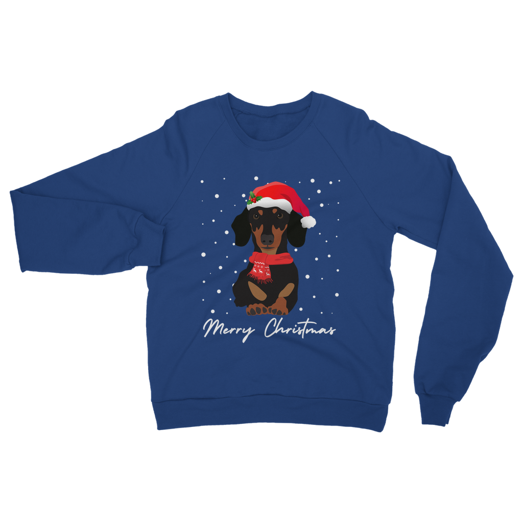 A royal blue Christmas sweatshirt featuring an illustration of a Dachshund wearing a Santa hat and a red winter scarf, with 'Merry Christmas' text at the bottom.