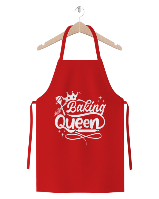 Baking Queen red cotton twill apron with crown and baking utensils design on wooden hanger