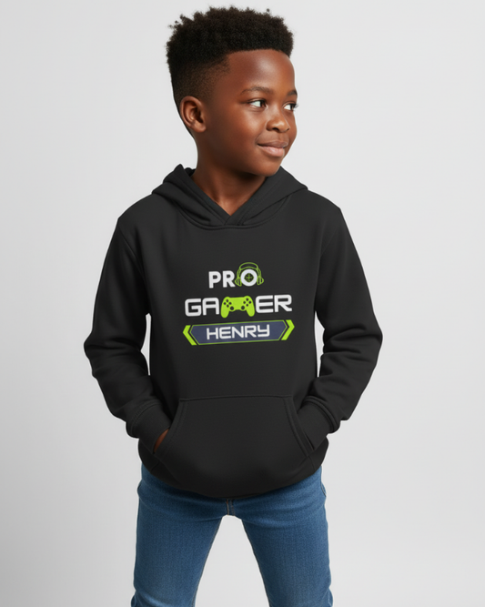 Boy wearing black personalised PRO Gamer hoodie with lime green headset and controller design and custom name, side glance pose, studio lighting.