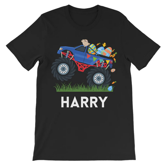 Boys personalised Easter t-shirt in black featuring a blue monster truck filled with colourful Easter eggs and carrots driving through grass, with the name ‘Harry’ printed in bold white letters underneath.
