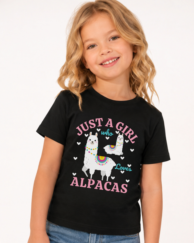 Girl wearing black "Just A Girl Who Loves Alpacas" T-shirt with denim shorts - studio setting