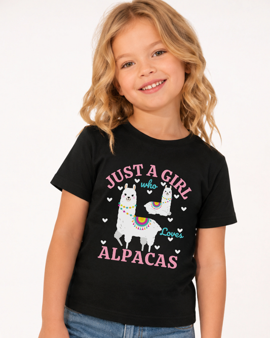 Girl wearing black "Just A Girl Who Loves Alpacas" T-shirt with denim shorts - studio setting