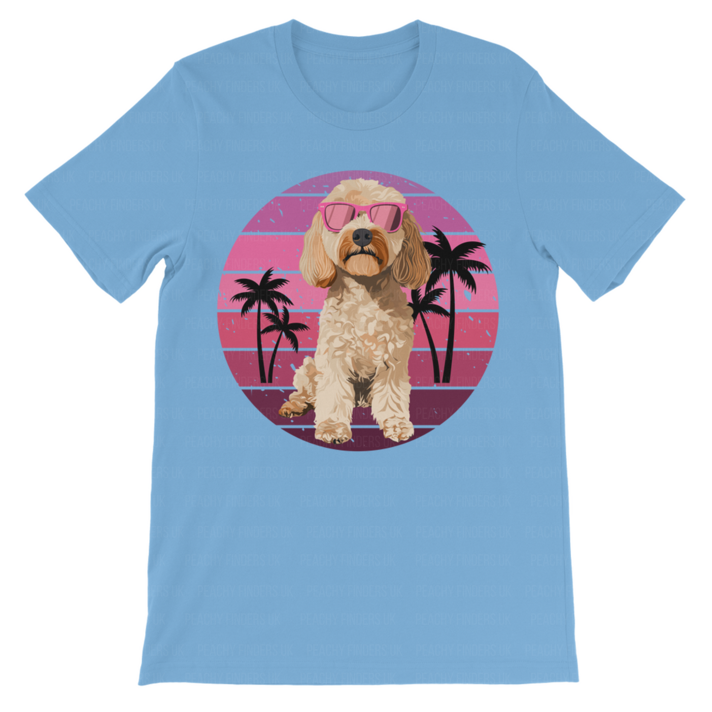 Kids light blue t-shirt featuring a Cockapoo dog with pink sunglasses in front of a retro pink sunset and palm tree background.