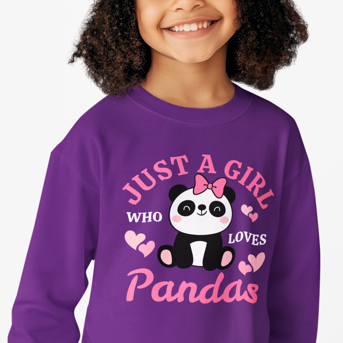 A young girl modelling a purple sweatshirt featuring a “Just a Girl Who Loves Pandas” slogan and cute panda illustration with hearts print on the front.