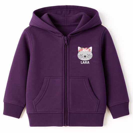 Girls purple personalised floral cat zip hoodie with custom name printed below a peaceful grey cat face wearing a pink and white flower crown