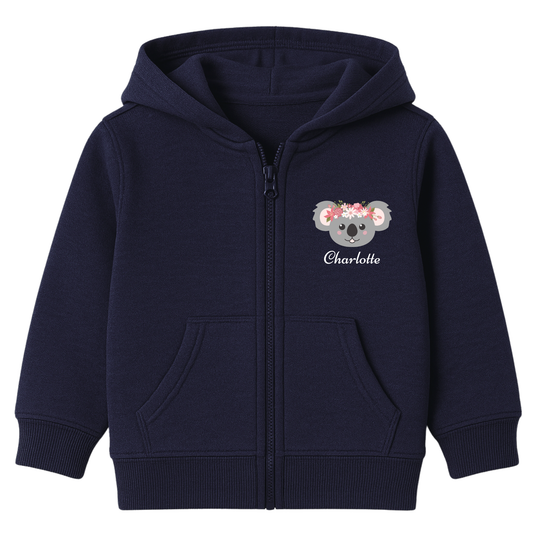 Girls navy zip hoodie featuring a cute grey koala face with a pink floral crown and custom name printed on the front left side.