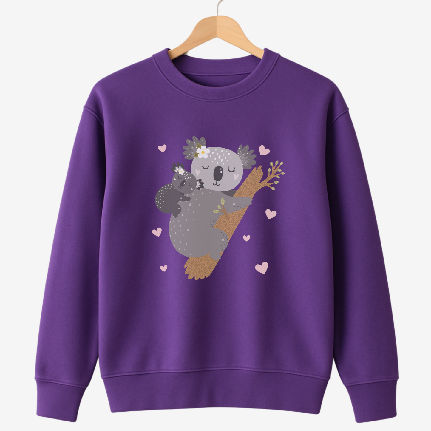 Purple sweatshirt with a koala design on a white background