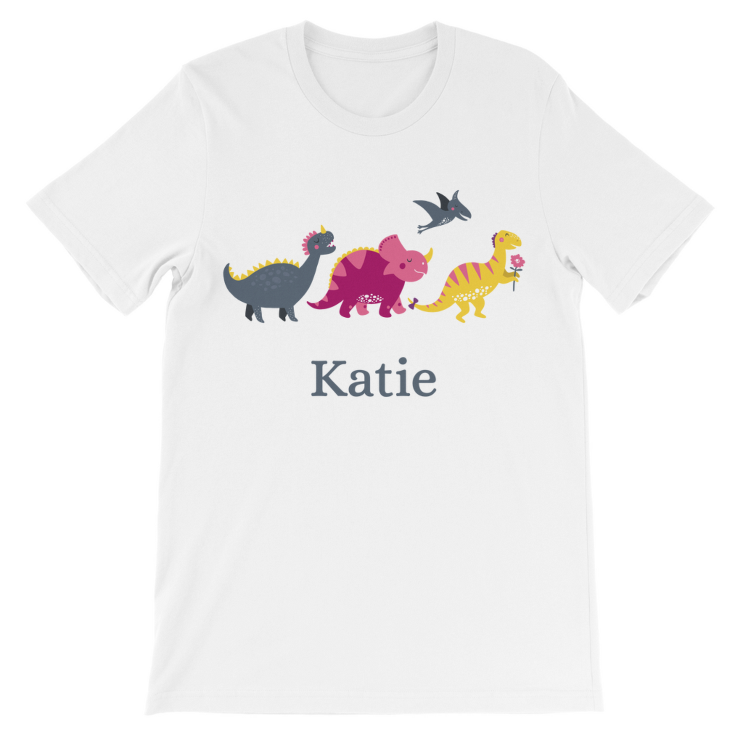 White t-shirt with colorful dinosaur illustrations and the name 'Katie' on a white background