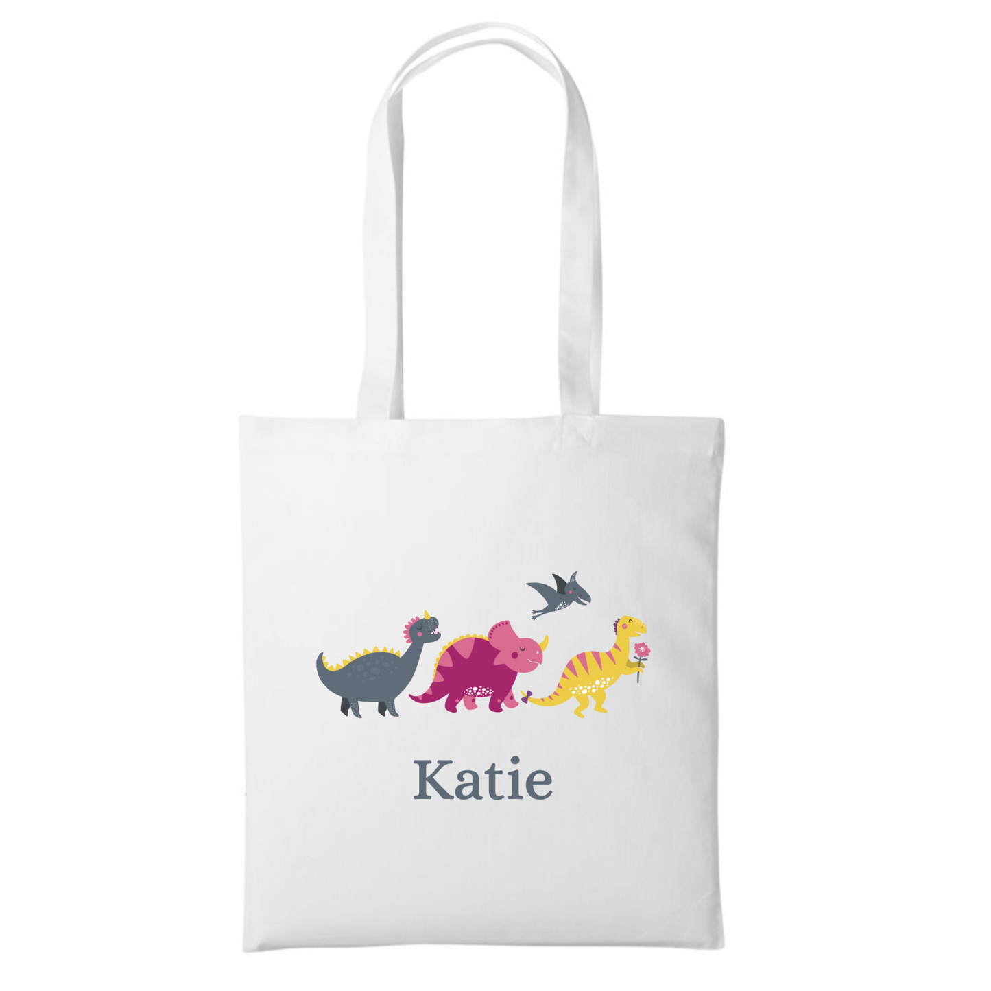 Child's white tote bag with colourful dinosaurs and the name 'Katie' printed underneath