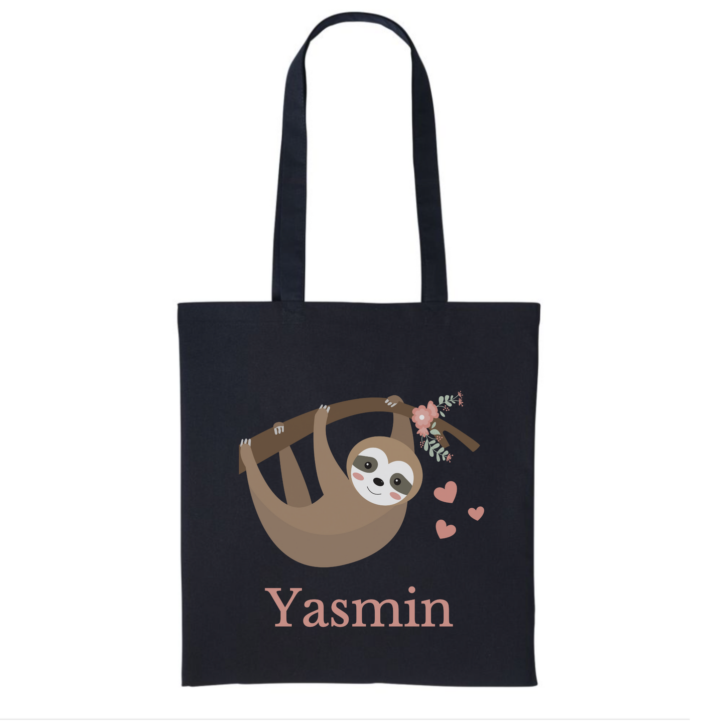 A black tote bag with a cartoon sloth hanging from a branch surrounded by pink flowers and hearts. The name "Yasmin" is printed below the sloth.