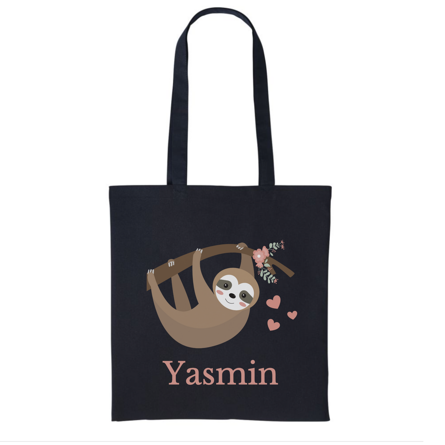 A black tote bag with a cartoon sloth hanging from a branch surrounded by pink flowers and hearts. The name "Yasmin" is printed below the sloth.
