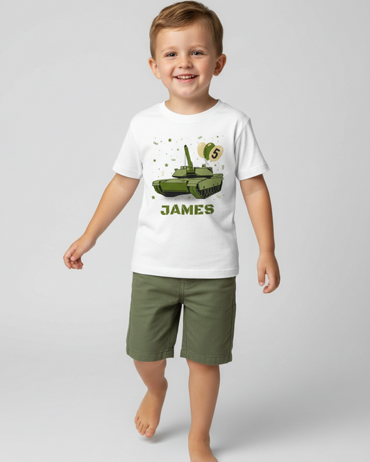 Boy wearing a white t-shirt with a tank graphic and the name 'James' on a plain background
