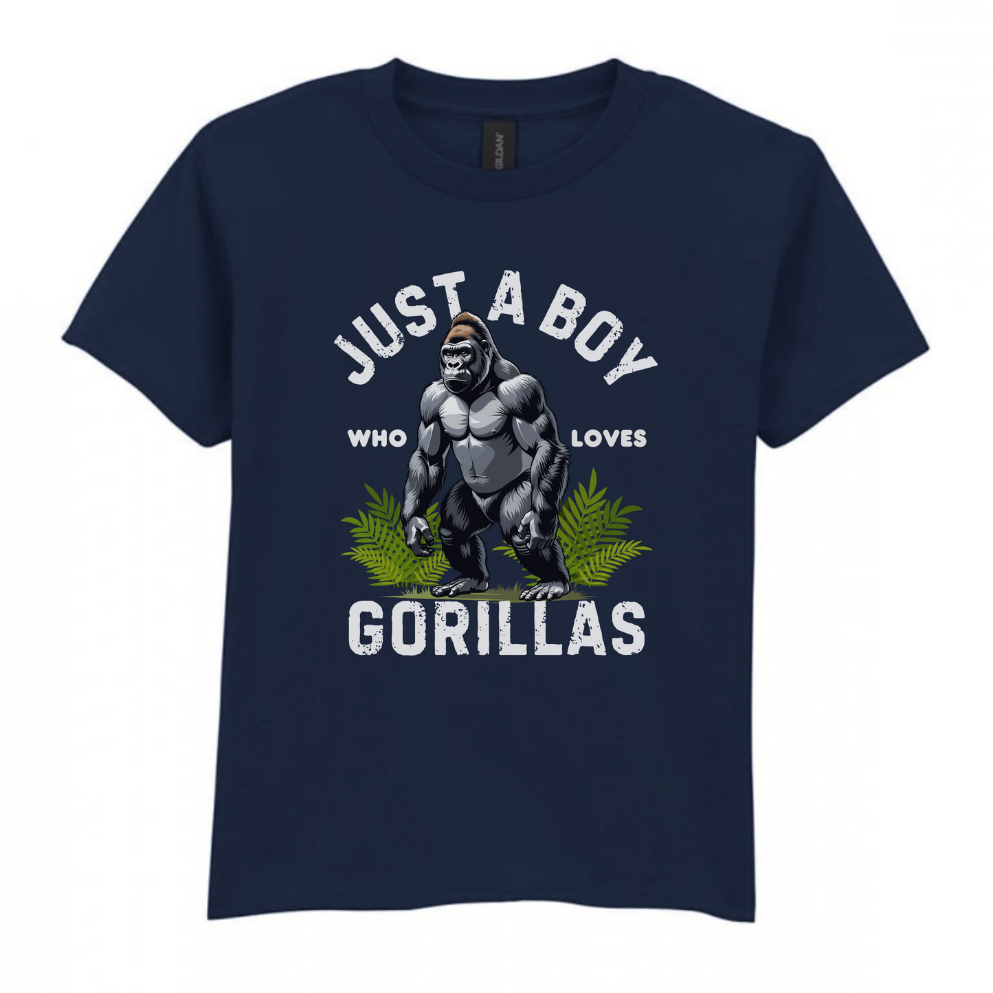 Kids navy cotton tee with “Just a Boy Who Loves Gorillas” text and gorilla graphic over green leaves, flat lay on white background.