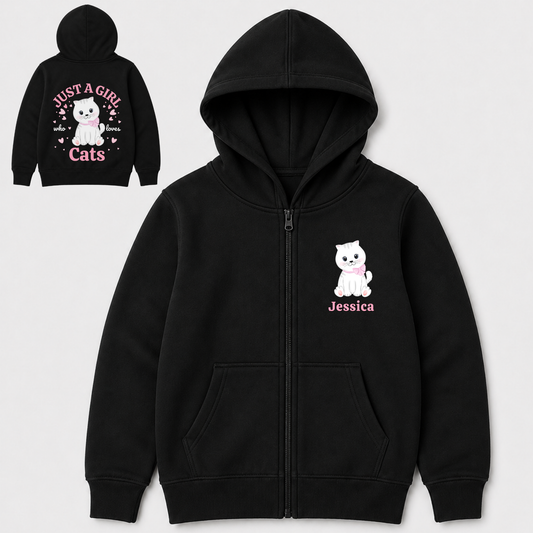 Girls personalised black zip hoodie with a white kitten and custom name on the front, plus a large pink “Just a Girl Who Loves Cats” back print.