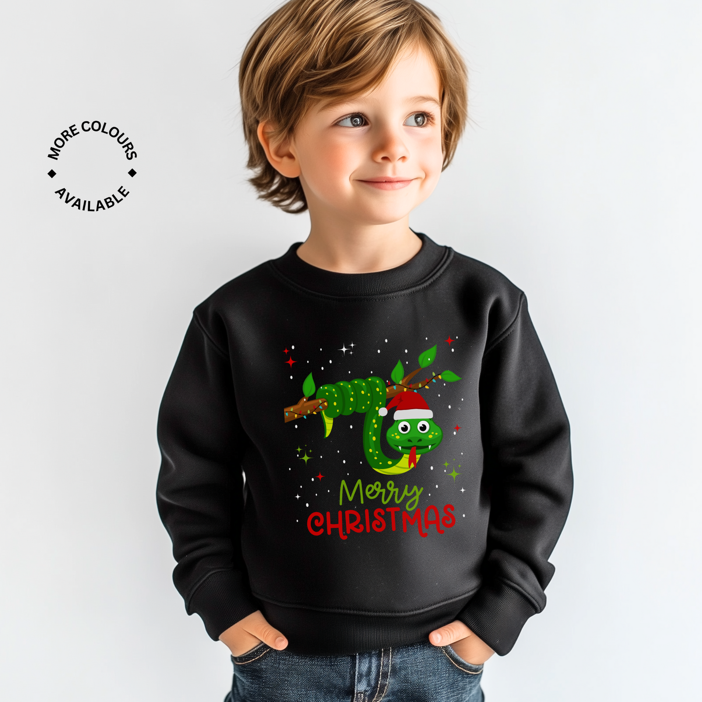 A child wearing a black Christmas jumper with a green snake design and the text 'Merry Christmas' on the front.