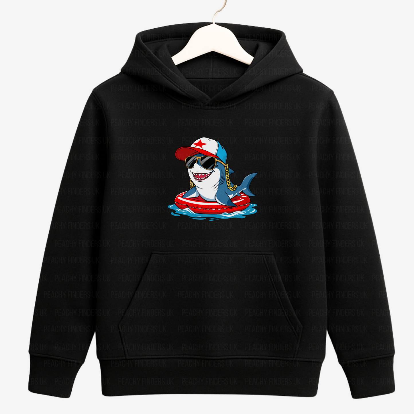 Black hoodie with a cartoon shark design on a white background