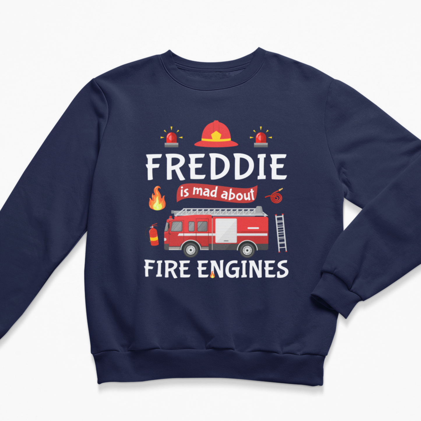 A kids navy blue crewneck sweatshirt featuring a graphic design on the front. The design displays a red fire engine with a ladder, small flames, a firefighter helmet, and the text 'FREDDIE is mad about FIRE ENGINES' in white and red lettering.