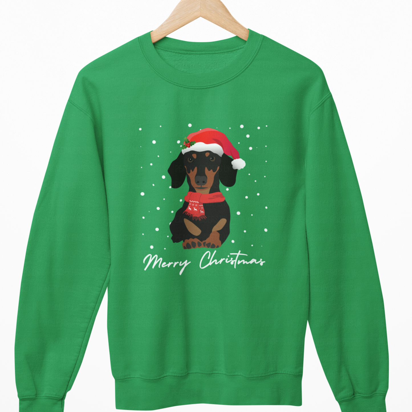Green sweatshirt with a Christmas-themed dachshund design on a white background