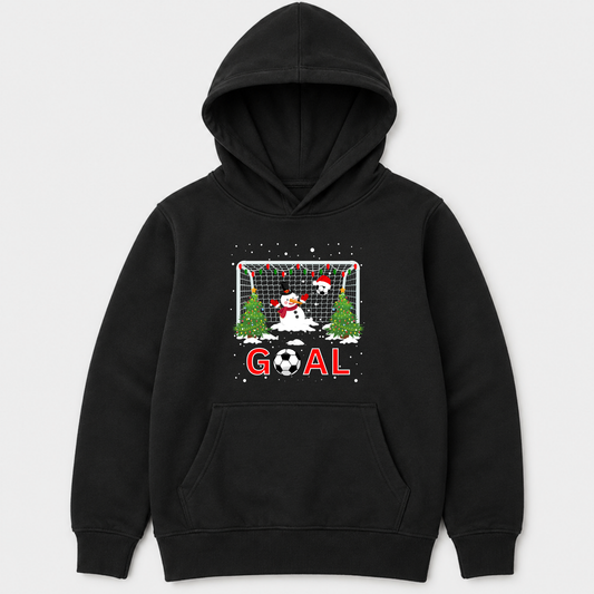 Children’s Christmas football hoodie in black featuring a snowman goalie, festive goal post, football trees, falling snow and red GOAL text.