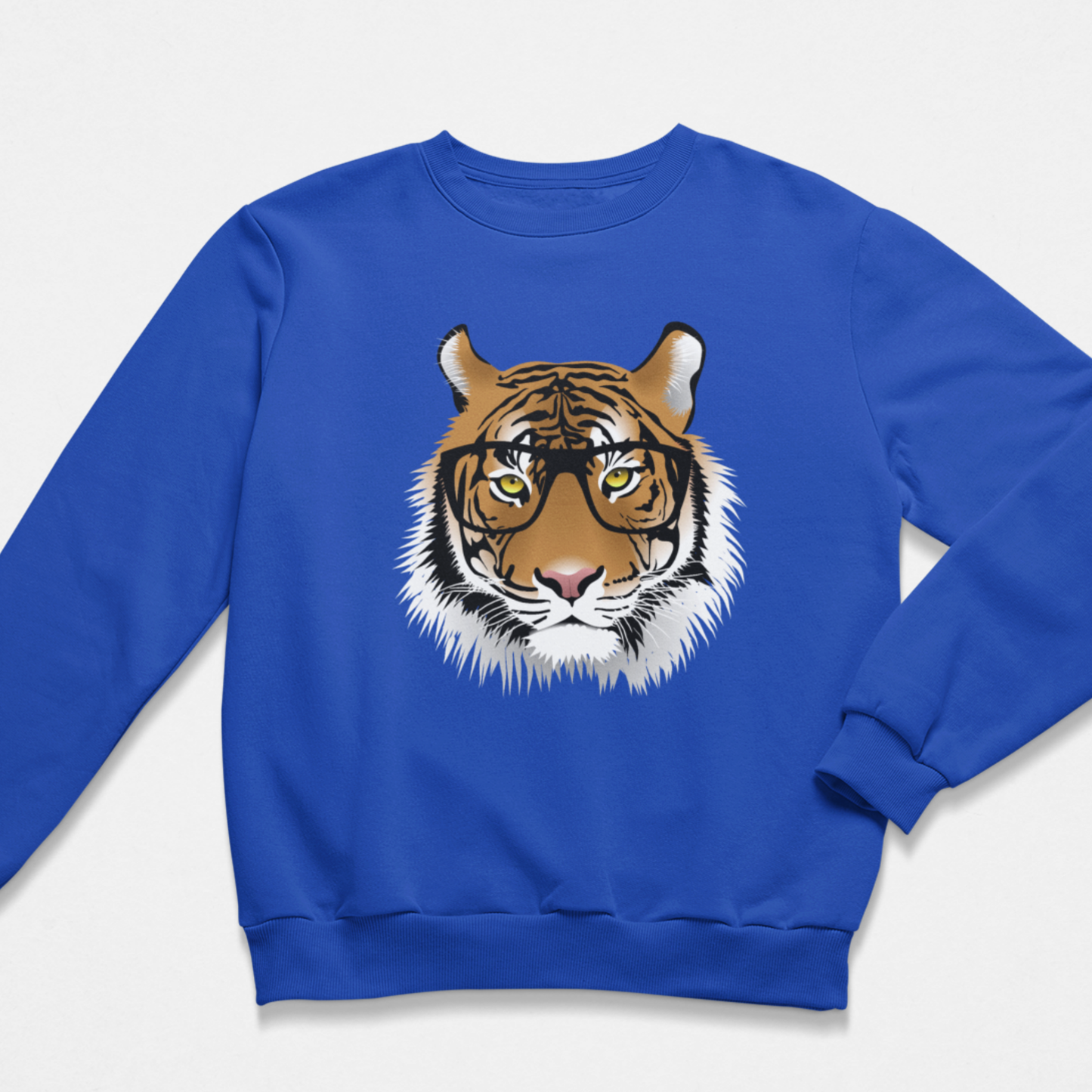 A kids royal blue crewneck sweatshirt featuring a graphic print of a tiger's face wearing black-rimmed glasses on the front, displayed against a clean white background.
