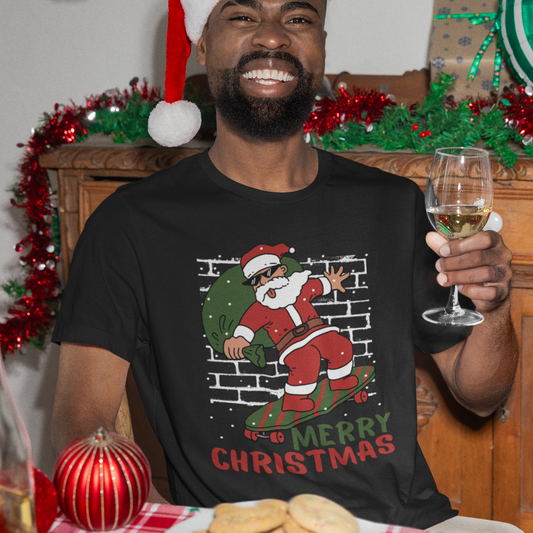 Man wearing a black Christmas t-shirt with a skateboarding Santa graphic, smiling and holding a glass of wine at a festive table
