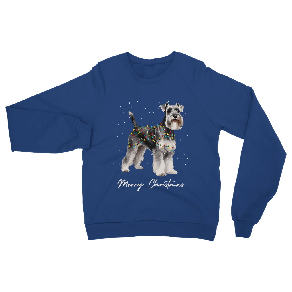 Royal blue festive sweatshirt laid flat, displaying a cute Schnauzer dog draped in Christmas lights under falling snow.