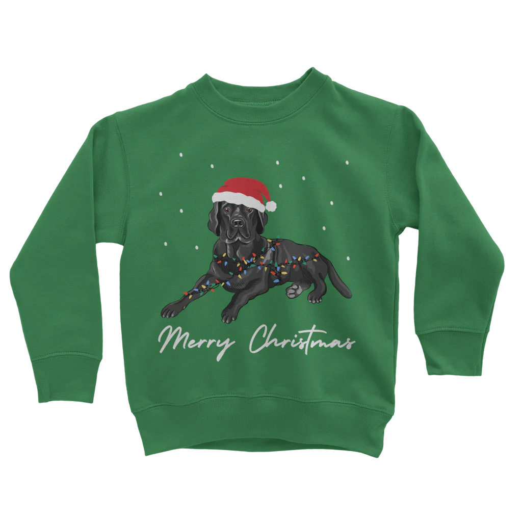 Kids green Christmas sweatshirt featuring a black Labrador wearing a Santa hat and wrapped in colourful fairy lights, with "Merry Christmas" text underneath.