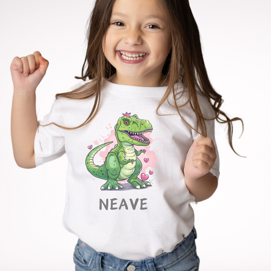Girl wears a princess t-rex t-shirt with pink hearts and personalised name