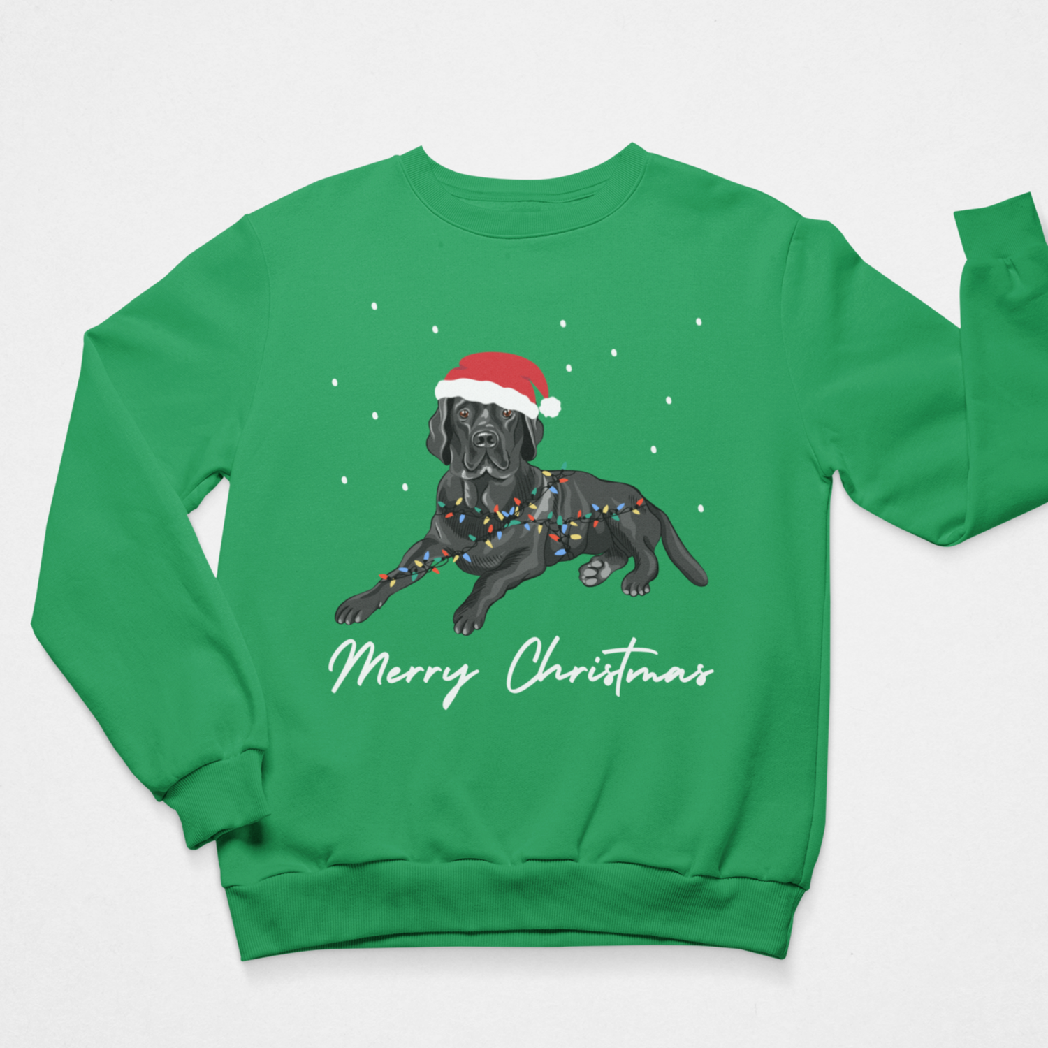 A green crewneck sweatshirt featuring a graphic of a black Labrador retriever wearing a red Santa hat and Christmas lights, with 'Merry Christmas' written in white script below.