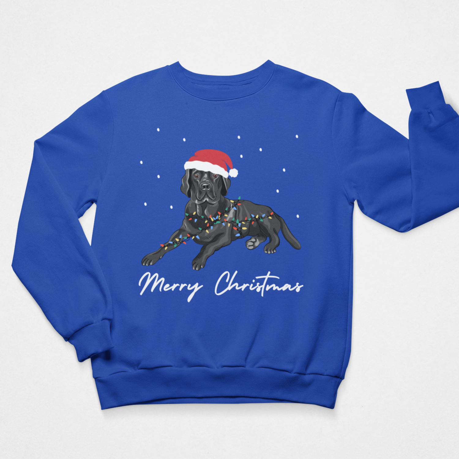 A royal blue crewneck sweatshirt featuring a graphic of a black Labrador retriever wearing a red Santa hat and holiday lights, with 'Merry Christmas' written in white script below, displayed on a light gray background.