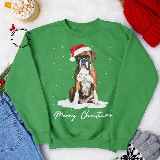 A green Christmas themed sweatshirt featuring a printed image of a boxer dog with a Santa hat, wrapped in Christmas lights, with text 'Merry Christmas' on the front.
