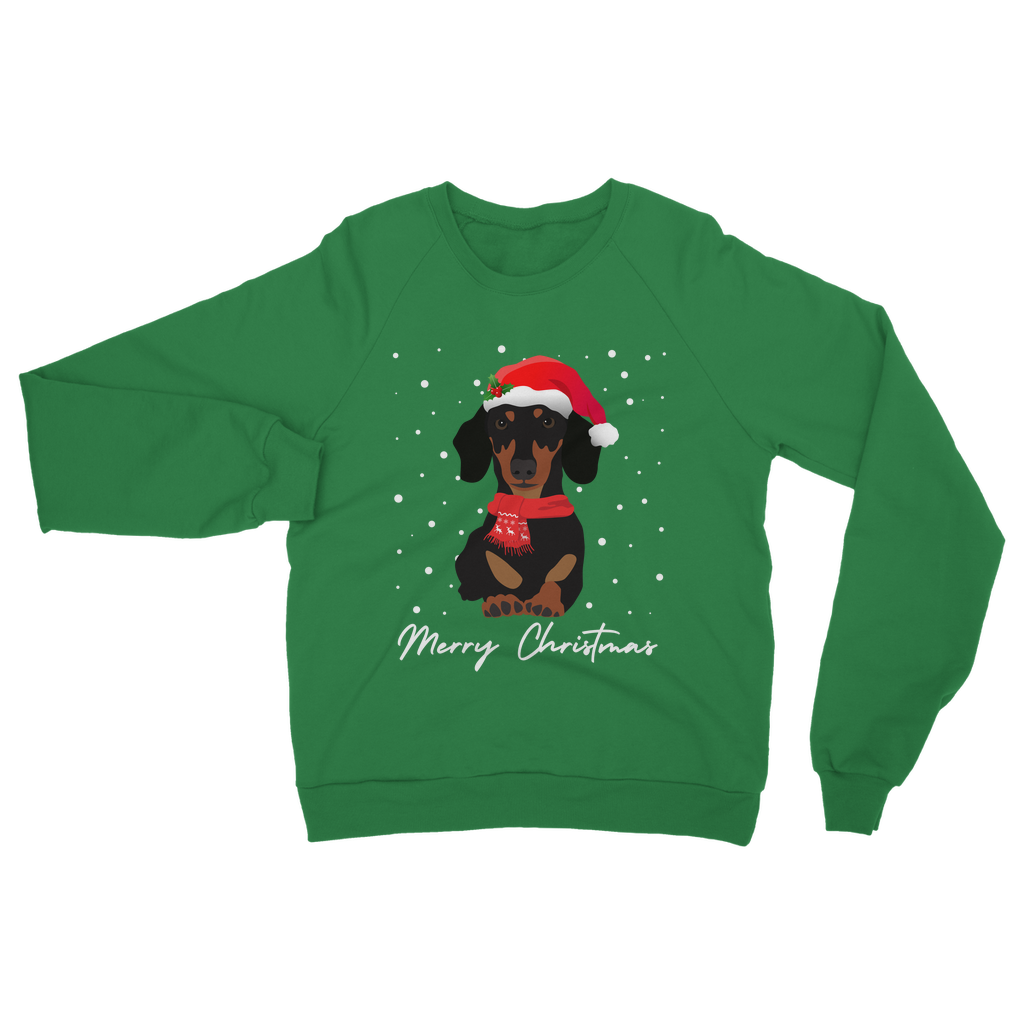 A green Christmas sweatshirt featuring an illustration of a Dachshund wearing a Santa hat and a red winter scarf, with 'Merry Christmas' text at the bottom.