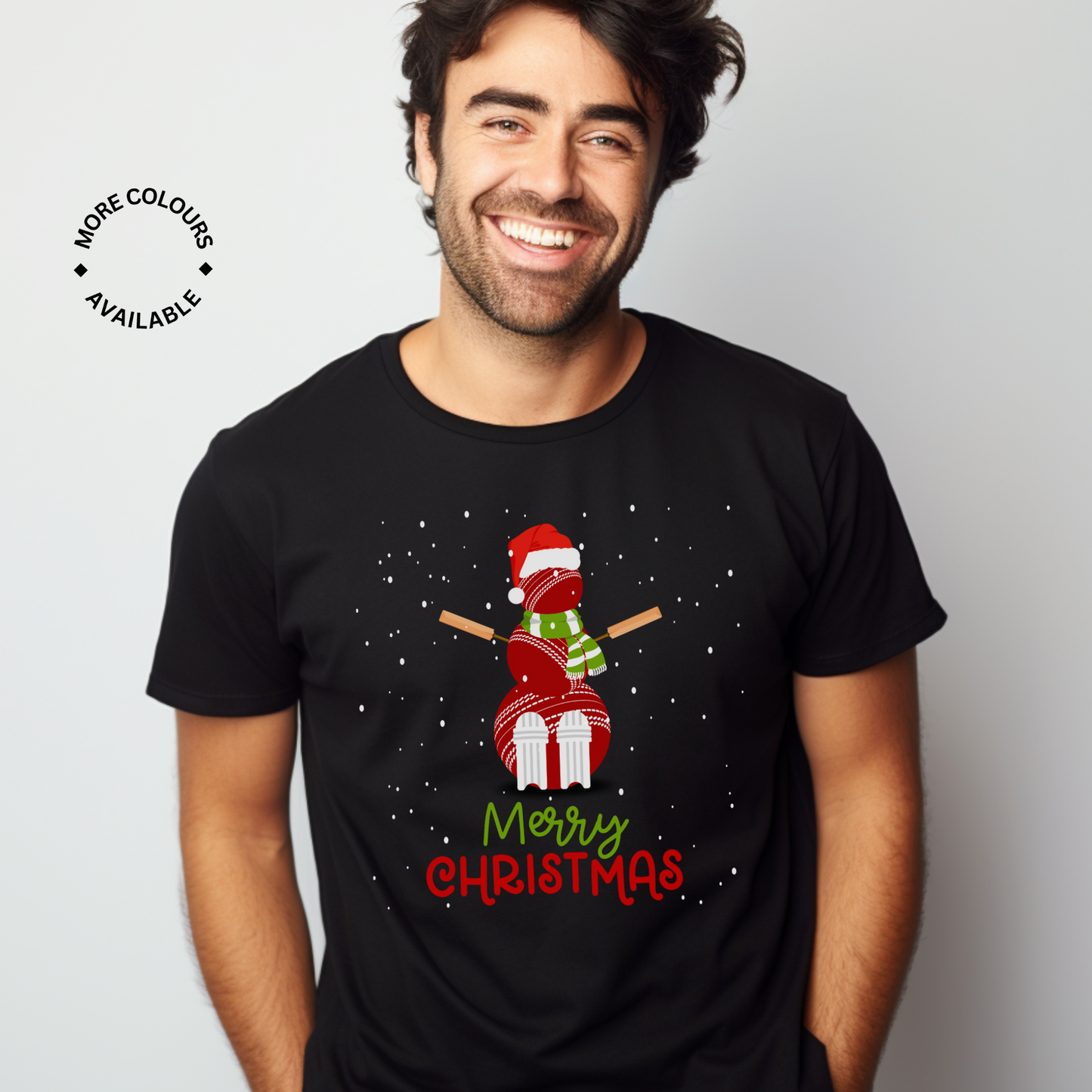 Man wearing a black Merry Christmas t-shirt with a snowman made out of cricket equipment 