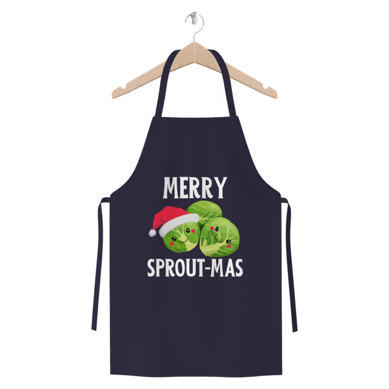 Navy Christmas apron on a hanger with cute Brussels sprout characters and the slogan “Merry Sprout-mas” printed on the front.