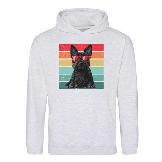 A light ash grey hoodie with a graphic of a black Scottie dog wearing red sunglasses against a multi-coloured vintage backdrop.