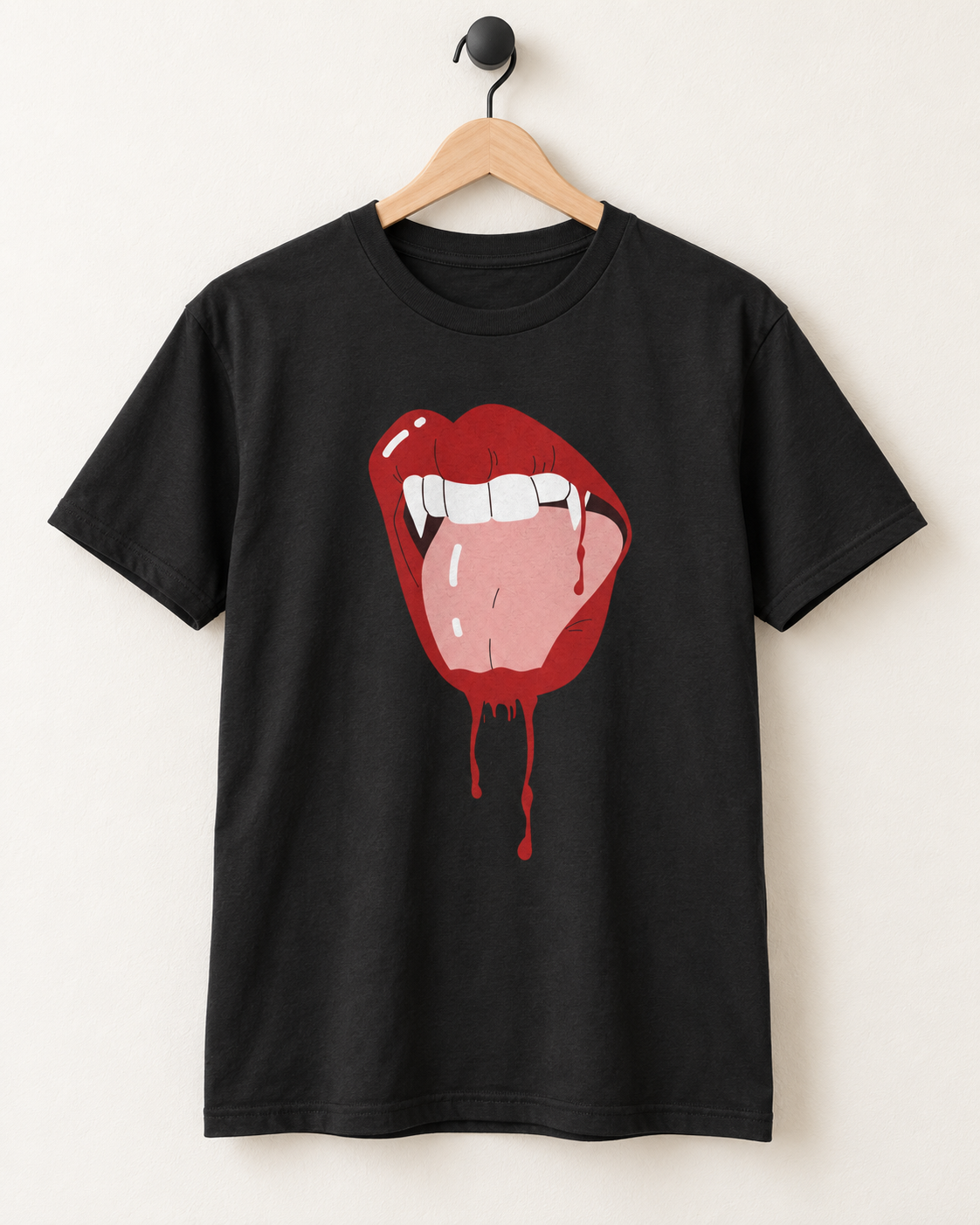 Black vampire lips Halloween T-shirt displayed on a wooden hanger hanging from a matte-black wall hook.