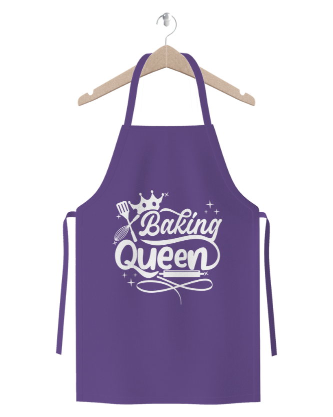 Baking Queen purple cotton twill apron with crown and baking tools graphic hanging on hanger