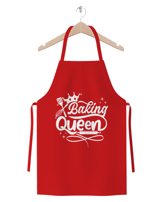 Baking Queen red cotton twill apron with crown and baking utensils design on wooden hanger