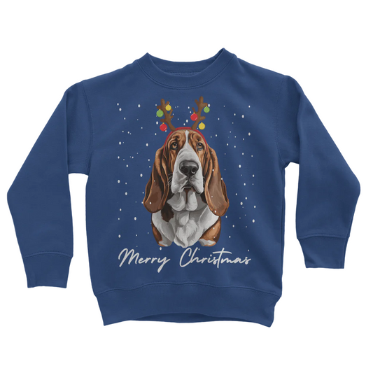 Kids royal blue sweatshirt with a graphic of a Basset Hound dog wearing festive antlers and the text 'Merry Christmas'.