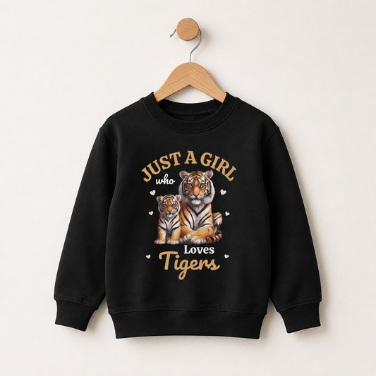 Black girls sweatshirt on a wooden hanger featuring a mother tiger and cub with small hearts and “Just a Girl Who Loves Tigers” text.