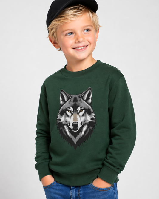 Child wearing green wolf graphic sweatshirt and black cap, side pose showing front design and casual outfit