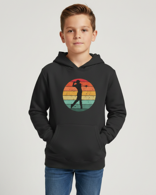 Boy wearing black kids retro golf hoodie with vintage golfer graphic and blue jeans studio model shot UK kids golf clothing