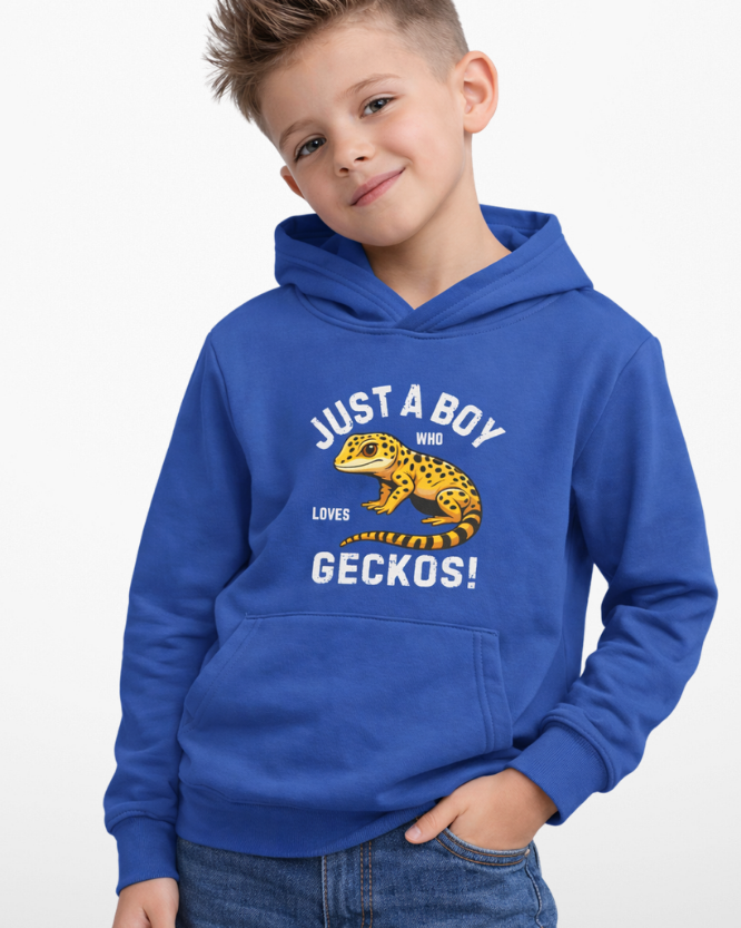 Young boy modelling royal blue “Just A Boy Who Loves Geckos” hoodie with leopard gecko print, styled with denim jeans on light grey background.