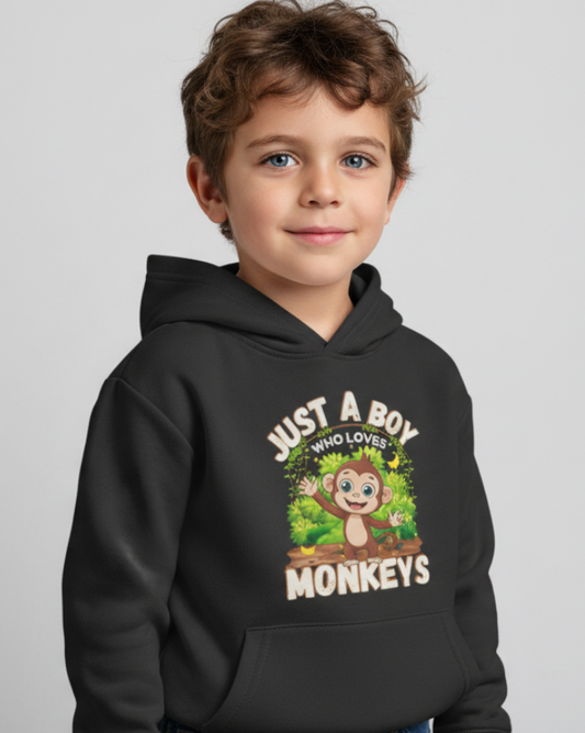 Boy wearing black kids hoodie with Just a Boy Who Loves Monkeys cartoon monkey graphic