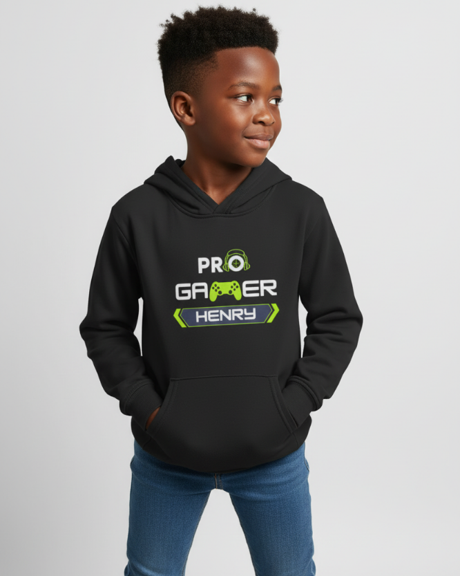 Boy wearing black personalised PRO Gamer hoodie with lime green headset and controller design and custom name, side glance pose, studio lighting.