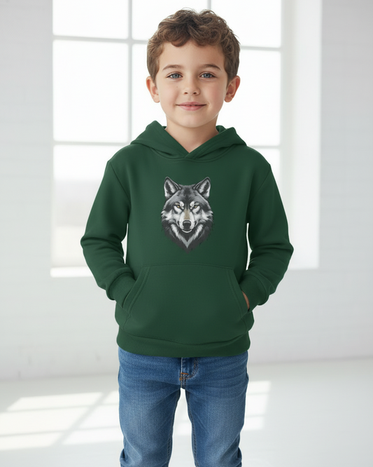 Boy modelling dark green kids hoodie with wolf graphic, full length studio photo with jeans, front view pullover hoodie