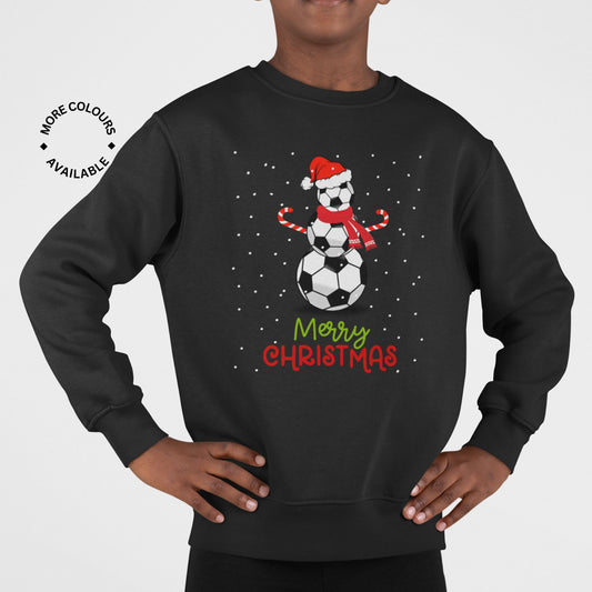 Boy wearing black Christmas sweatshirt with football snowman design, featuring Santa hat, scarf, candy canes, snowflakes, and “Merry Christmas” text.