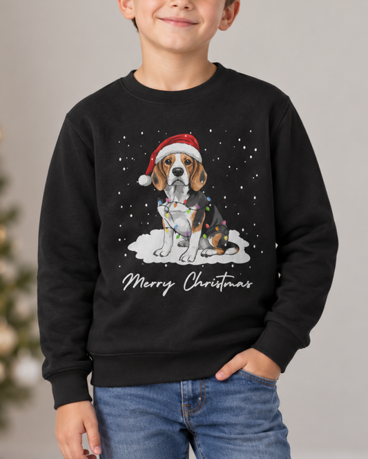 A child wearing a black crewneck sweatshirt with a festive graphic of a beagle dog in a Santa hat and the text 'Merry Christmas' on the front, paired with blue jeans.