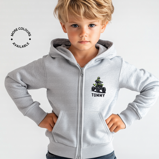 Child wearing a grey zip hoodie with a quad bike and name to left side of chest