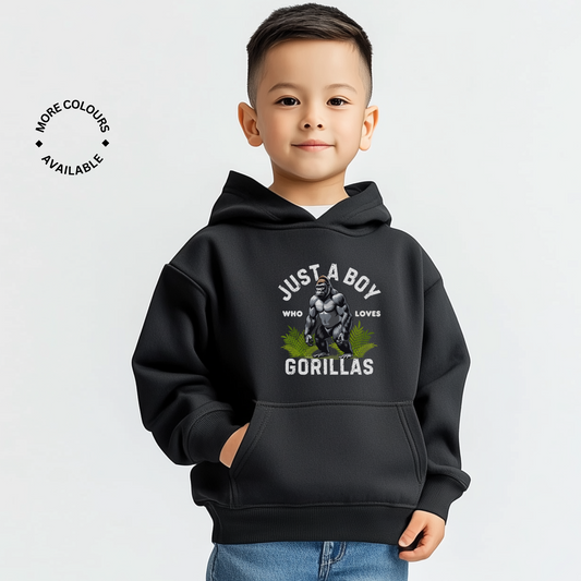 Young boy wearing a black hoodie with a graphic gorilla and the slogan "Just A Boy Who Loves Gorillas."